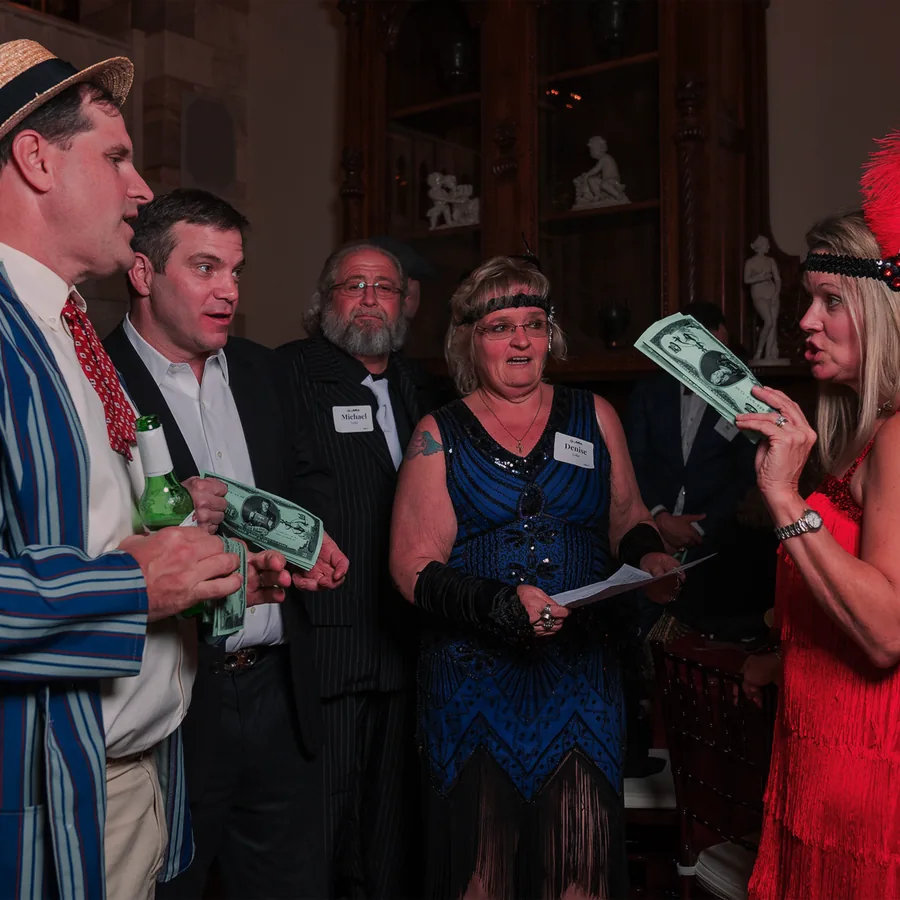 Guests at a Murder Mystery Company public dinner show in Detroit