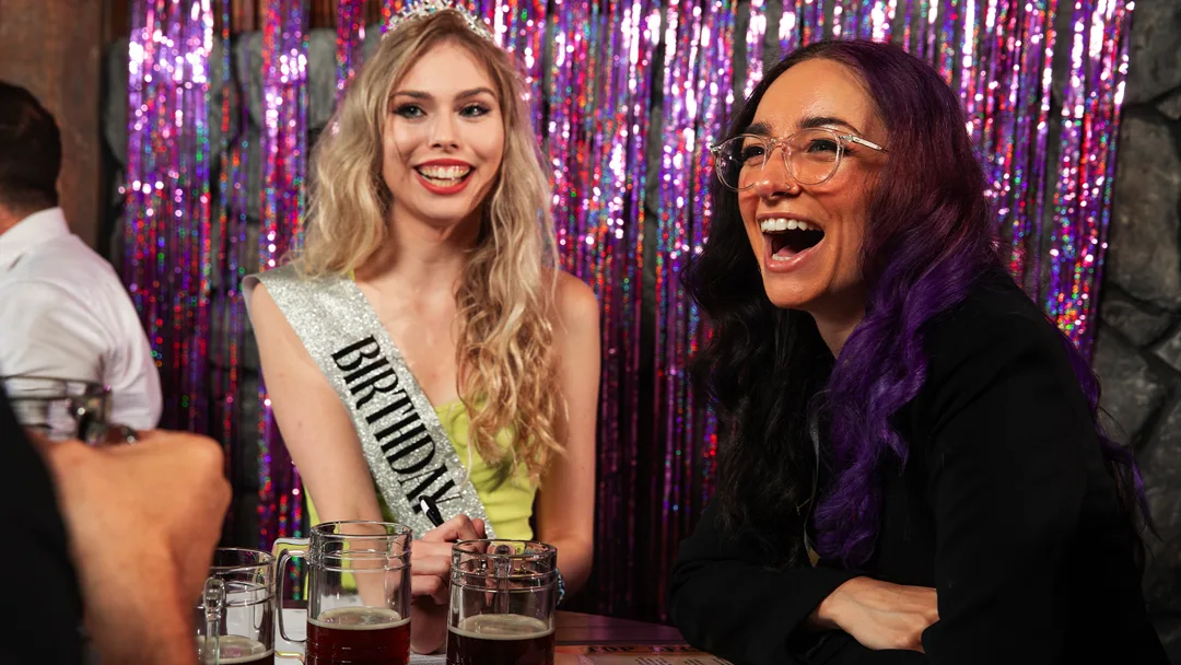 Guests celebrating at a Detroit murder mystery party